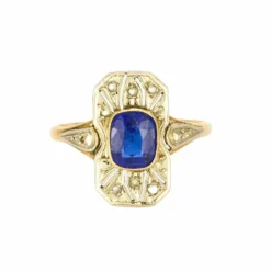 Bague style Art Déco or jaune et or blanc, saphir synthétique et diamants