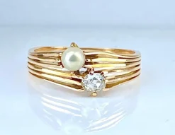 Bague toi et moi en or jaune, diamant et perle vers 1900