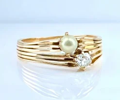 Bague toi et moi en or jaune, diamant et perle vers 1900