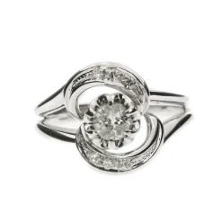 Bague tourbillon diamants