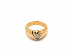 Bague tourbillon godronné en or jaune 750 mil