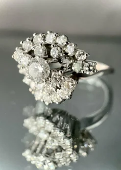 Bague tourbillon or blanc diamants