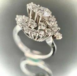Bague tourbillon or blanc diamants