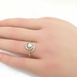 Bague tourbillon or et diamants