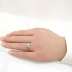 Bague tourbillon or et diamants