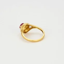 Bague Tourbillon or jaune rubis diamants