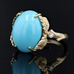 Bague turquoise diamants monture feuillagée