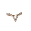Bague V en or rose et diamants
