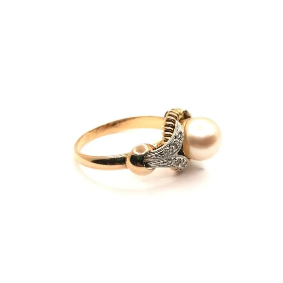 Bague vintage or jaune et perle de culture