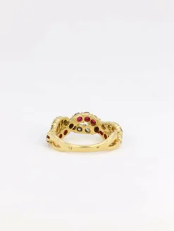 Bague vintage torsadée en or, diamants et rubis