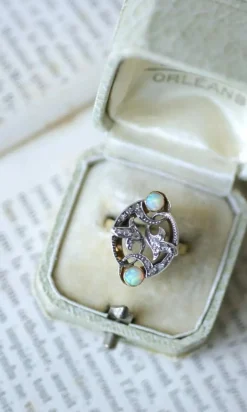 Bague volutes Or jaune Argent Diamants Opales