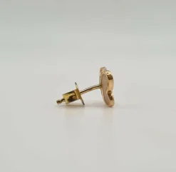 Boucle d’oreille papillon or jaune sertie d’une nacre