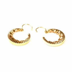Boucles créoles or jaune à décor rayonnant