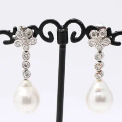 Boucles d'oreilles avec perle d'Australie et diamants