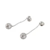 Boucles d'oreilles boules en or gris, diamants