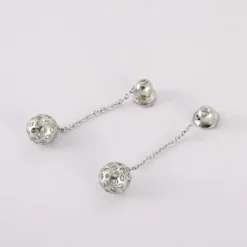 Boucles d'oreilles boules en or gris, diamants