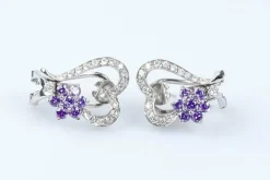 Boucles d'oreilles coeurs et fleurs en or blanc 18 carats