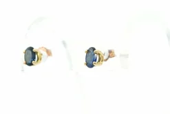 Boucles d'oreilles contemporaines en or jaune serties de saphirs