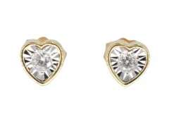 Boucles d'oreilles en or avec un diamant taille brillant en forme de cœur