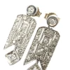 Boucles d'oreilles en or blanc avec diamants