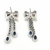 Boucles d'oreilles en or blanc avec saphirs et diamants
