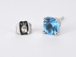 Boucles d'oreilles en or blanc avec topaze