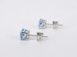 Boucles d'oreilles en or blanc avec topaze