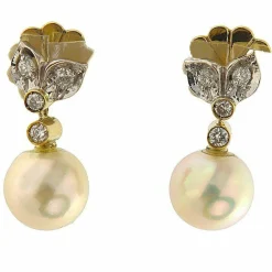 Boucles d'oreilles en or jaune et blanc avec diamants et perles