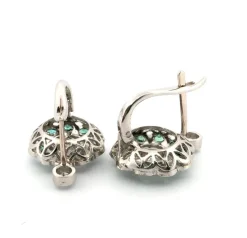 Boucles d'oreilles en platine avec émeraudes et diamants