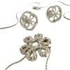 Boucles d'oreilles et collier contemporains en or sertis de diamants