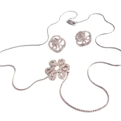 Boucles d'oreilles et collier contemporains en or sertis de diamants