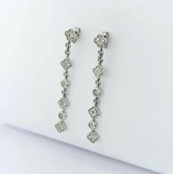 Boucles d'oreilles or blanc et diamants