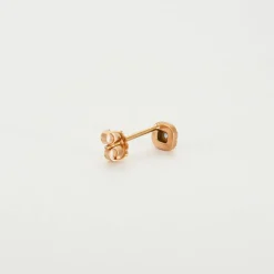 Boucles d'oreilles or rose 18 carats sertie de diamants et saphir