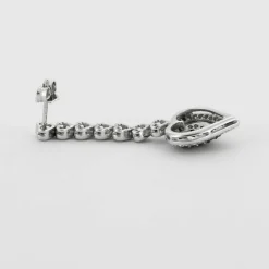 Boucles d'oreilles pendantes coeur diamants