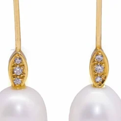 Boucles d'oreilles perle ovale et diamant