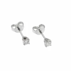 Boucles d'oreilles point lumineux avec diamants