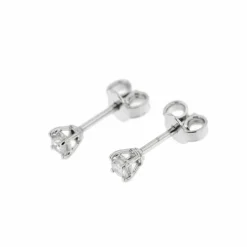 Boucles d'oreilles point lumineux avec diamants