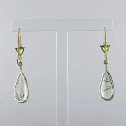 Boucles d'oreilles quartz à rutile grenats tsavorites et diamants