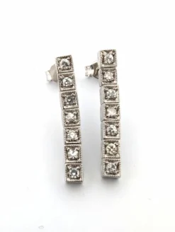 Boucles d'oreilles tennis en platine avec diamants