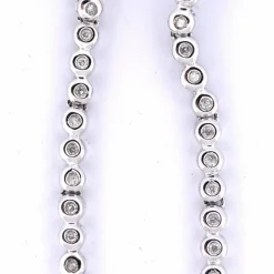 BOUCLES D'OREILLES ''TENNIS'' - OR BLANC 18 KT
