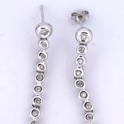 BOUCLES D'OREILLES ''TENNIS'' - OR BLANC 18 KT