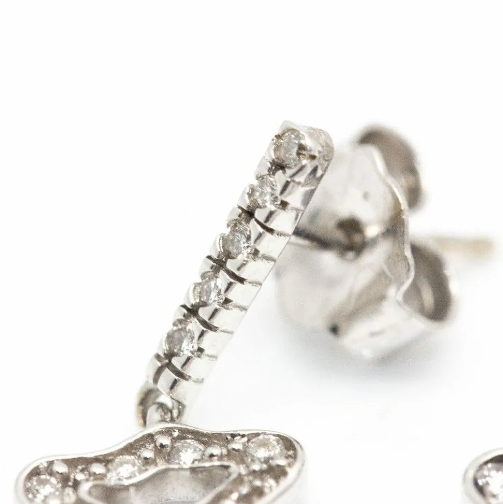 Boucles d'oreilles TOUS Or blanc et diamants.