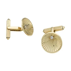 Boutons de manchette en or jaune et diamants.