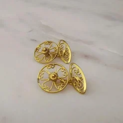 Boutons de manchette filigranés