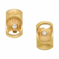 Boutons de manchettes "bambou" en or jaune et diamants, 1970.