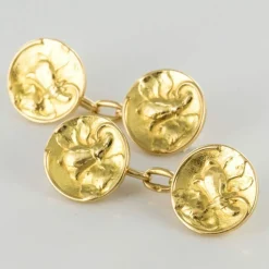 Boutons de manchettes or lys