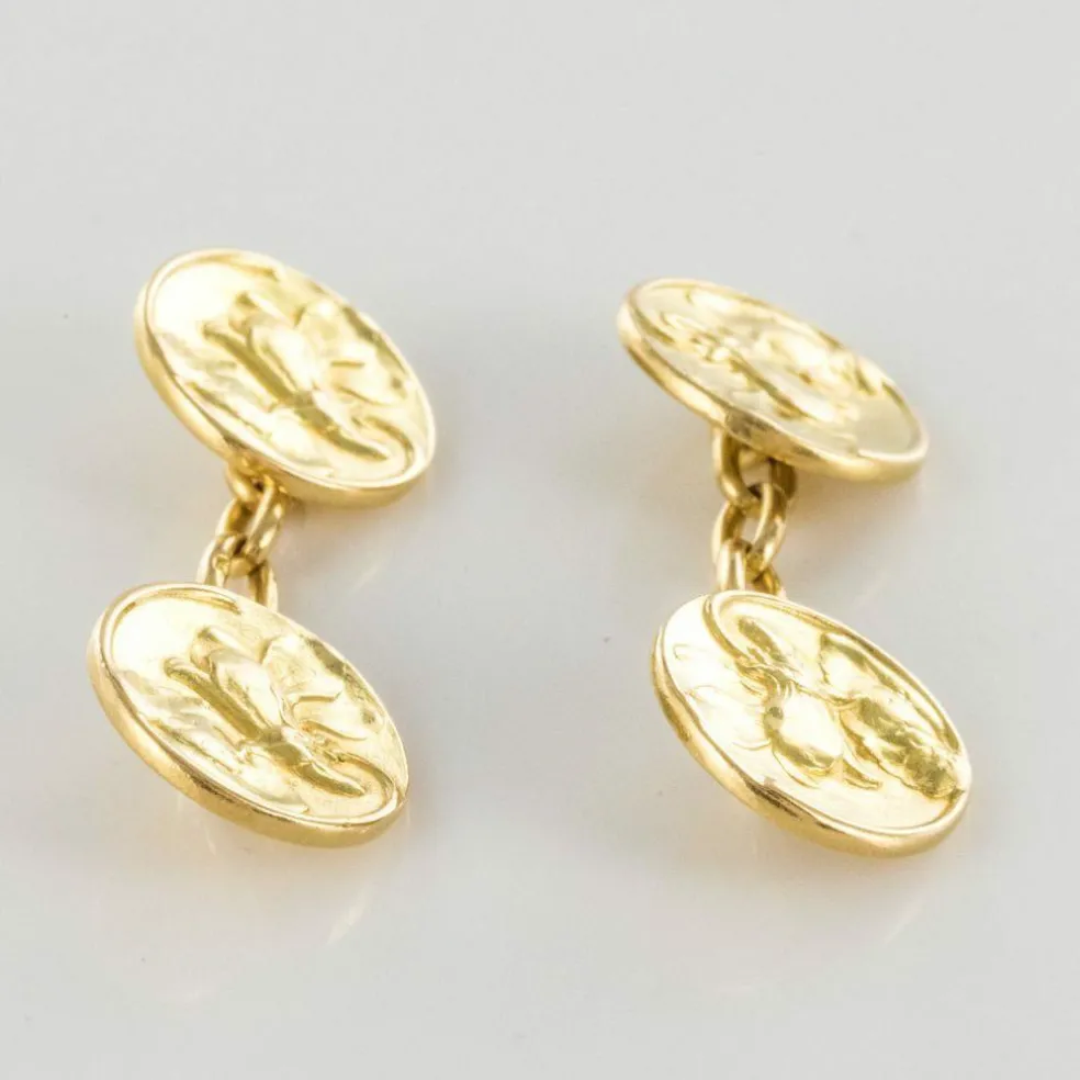 Boutons de manchettes or lys