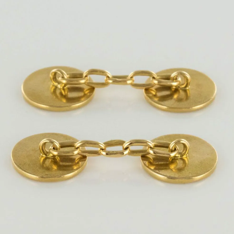 Boutons de manchettes or lys