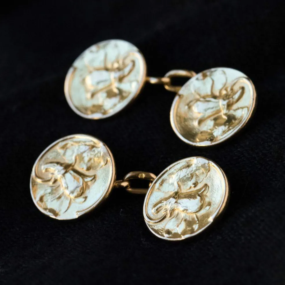 Boutons de manchettes or lys