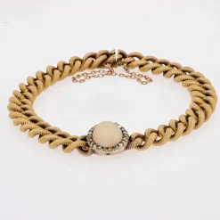Bracelet ancienne gourmette et son motif opale diamants